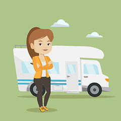 Image showing Woman standing in front of motor home.