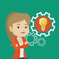 Image showing Woman with business idea bulb in gear.