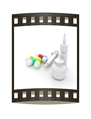 Image showing Syringe, tablet, pill jar. 3D illustration. The film strip