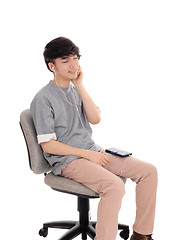 Image showing Asian man enjoying the music.