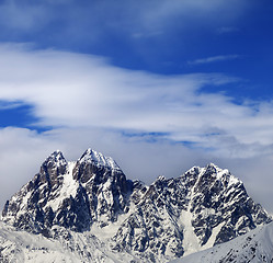 Image showing Mounts Ushba and Chatyn and blue sky with clouds