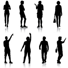 Image showing Set Black silhouettes of beautiful man and woman on white background. illustration