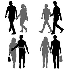 Image showing Set Silhouette man and woman walking hand in hand