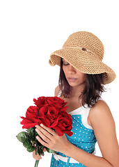 Image showing Beautiful woman with bunch of red roses.