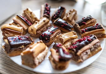 Image showing plate of eclairs