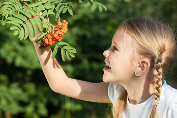 Image showing portrait of a beautiful young girl  in park