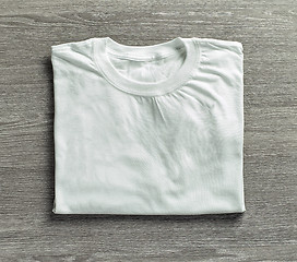 Image showing white shirt on grey wood background