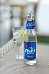 Image showing carbonated water in glass bottle on the table