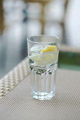 Image showing a glass of carbonated water and a lemon