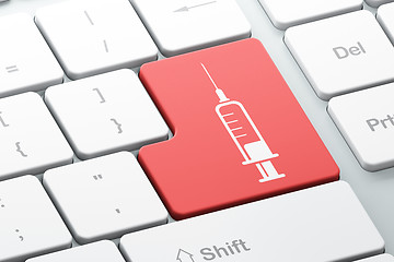 Image showing Health concept: Syringe on computer keyboard background