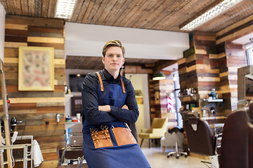 Image showing male hairdresser at hair salon or barbershop