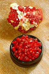 Image showing broken ripe pomegranate fruit and seeds