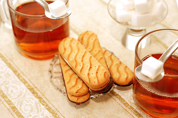 Image showing table set for high tea with sweet cookies