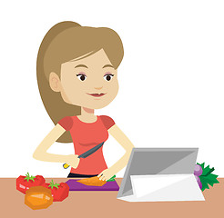 Image showing Woman cooking healthy vegetable salad.