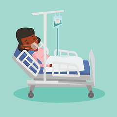 Image showing Patient lying in hospital bed with oxygen mask.