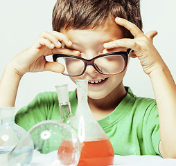 Image showing little cute boy with medicine glass isolated wearing glasses smi