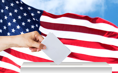 Image showing hand of american with ballot and box on election