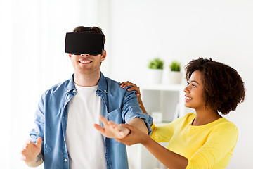 Image showing happy couple with virtual reality headset at home