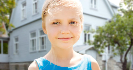 Image showing happy little girl over living house background