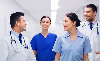 Image showing happy group of medics or doctors at hospital