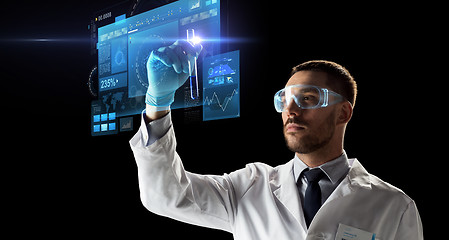 Image showing scientist in goggles with test tube virtual screen