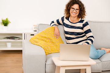 Image showing Beautiful woman working at home