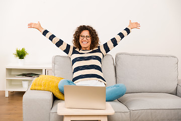 Image showing Beautiful woman working at home