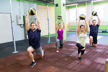 Image showing group of people with medicine ball training in gym