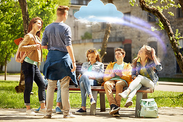 Image showing teenage students with tablet pc at school yard