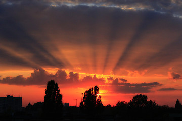 Image showing summer sunset with dark sky and sun