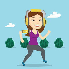 Image showing Woman running with earphones and smartphone.