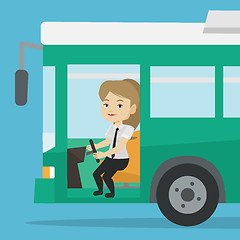 Image showing Caucasian bus driver sitting at steering wheel.