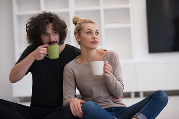 Image showing young couple in their new home