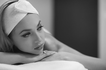 Image showing woman laying on massage table