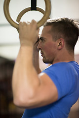 Image showing man doing dipping exercise