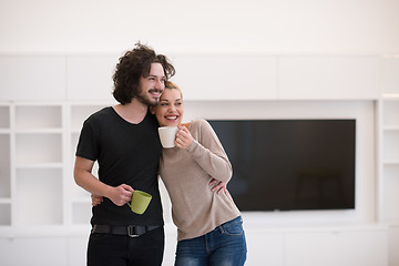 Image showing Happy couple in their new home