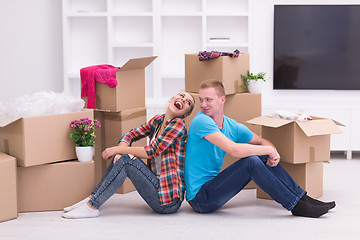 Image showing young couple moving  in new house