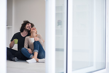 Image showing young couple in their new home