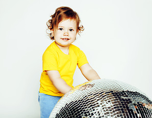 Image showing little cute adorable baby girl holding disco ball isolated on white close up, sweet real toddler