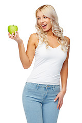 Image showing happy beautiful young woman with green apple
