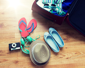 Image showing close up of travel bag with clothes and stuff