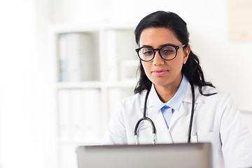 Image showing female doctor with laptop at hospital