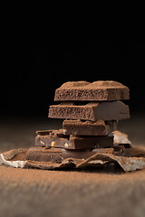 Image showing Pieces of chocolate on paper