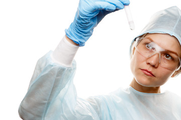 Image showing Lab assistant looks at tube