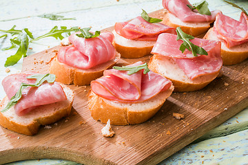 Image showing Sandwiches with ham and greens