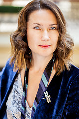 Image showing beautiful woman with a dragonfly brooch