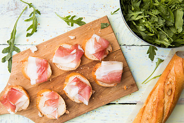 Image showing Bread with bacon on table