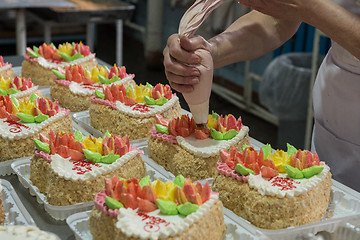 Image showing Manual cakes production