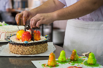 Image showing Manual cakes production