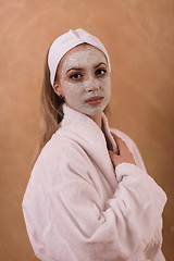 Image showing Spa Woman applying Facial Mask